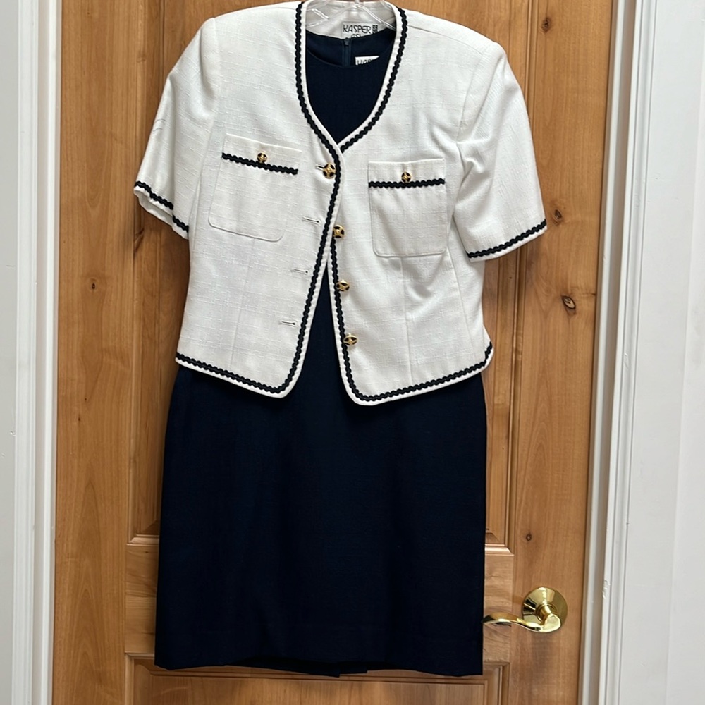 Kasper navy dress with white jacket.